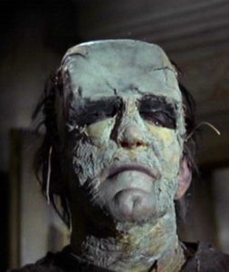 Kiwi Kingston as the Monster, Evil of Frankenstein